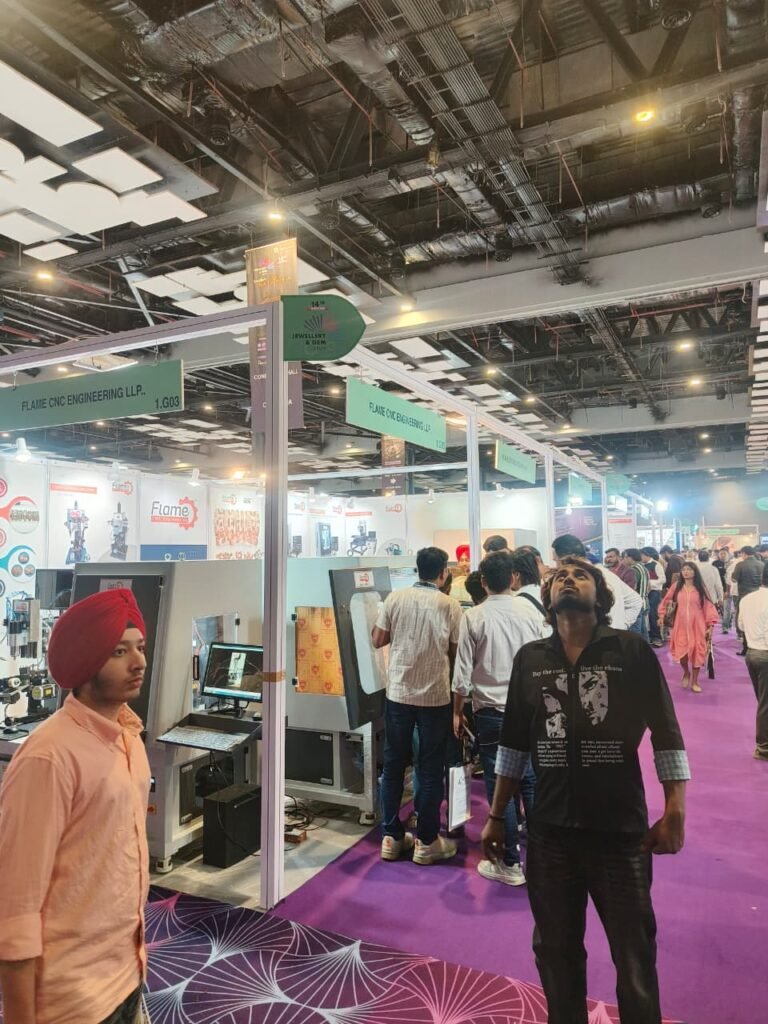 Visitors exploring jewellery making machines at Flame Engineering DJGF 2026 stall